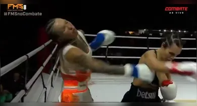 Imagem ilustrativa da notícia: Mendigata fica com seio à mostra, mas vence luta do Fight Music Show