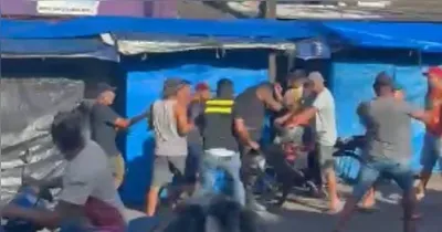 O suspeito foi contido e agredido por populares.