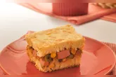 Aprenda a preparar um delicioso cachorro-quente de forno com nossa receita fácil e prática que rende 6 porções!