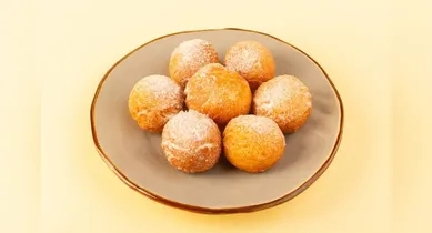 Imagem ilustrativa da notícia: Bolinho de chuva: aprenda receita sequinha e macia para acompanhar o café
