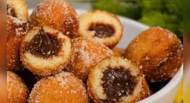 Imagem ilustrativa da notícia: Bolinho de chuva trufado de brigadeiro fofinho e recheado