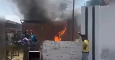 As chamas no imóvel foram contidas pelos bombeiros antes que atingisse outras residências