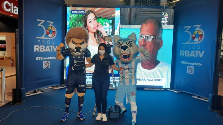 Mariana Malato junto com os mascotes de Remo e Paysandu.