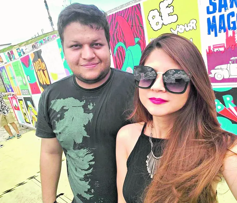 O analista de TI Fabrício Oliveira e a esposa Mileide no Lolla de 2018: volta aguardada