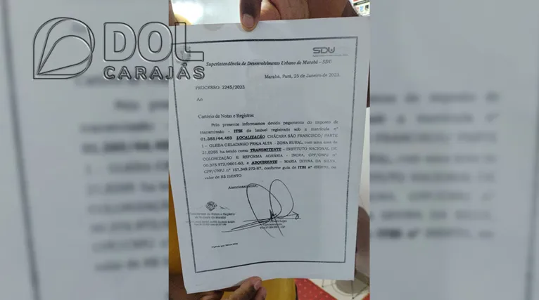 Adelmar Souza mostrou um documento emitido pela SDU, de "pagamento de imposto de transmissão" do terreno