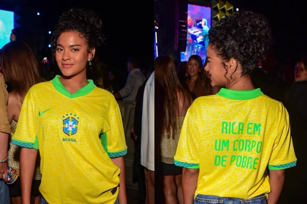 Bella Campos foi ao local com uma camiseta da seleção brasileira e com a frase às costas: "Rica em um corpo de pobre".