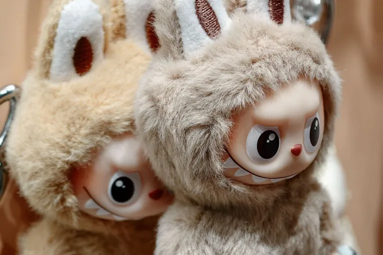 CHONGQING, CHINA - AUGUST 28 2025: The mini-version of the popular toy Labubu in an outlet of Pop Mart in southwest China's Chongqing Municipality Thursday, Aug. 28, 2025.