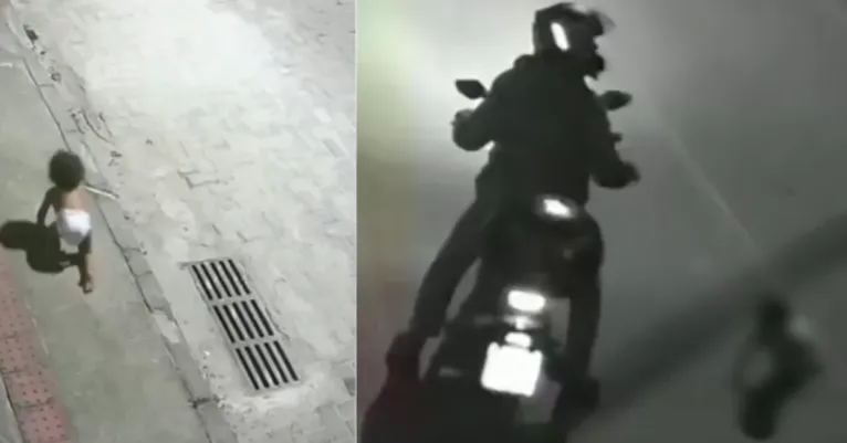 Bebê engatinhando sozinha na rua é salva por motoqueiro