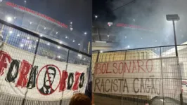 Faixas de protesto contra a presença do ex-presidente Jair Bolsonaro no Morumbi.