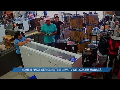 Imagem ilustrativa da notícia Vídeo: câmeras flagram momento em que dupla furta TV de loja