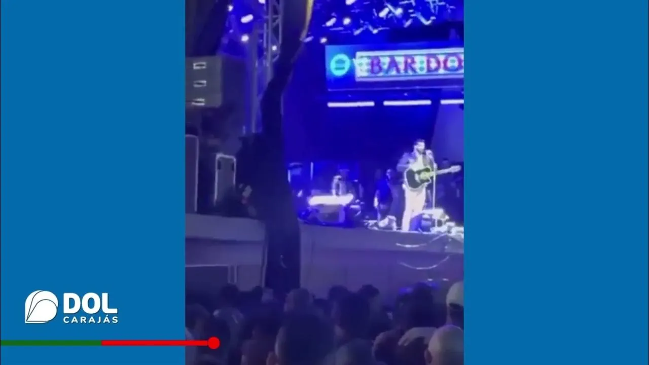 Imagem ilustrativa da notícia Vídeo: mulher cai do palco tentando alcançar Gusttavo Lima